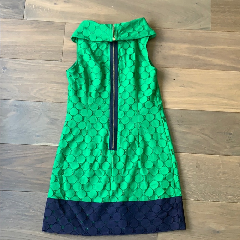 60’s inspired sleeveless dress with back zipper.